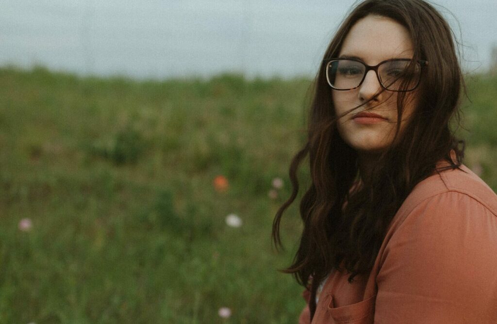 Emily Beck holding a book